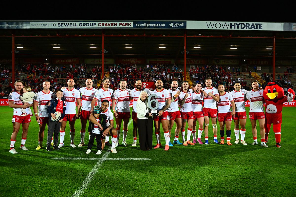 Hull KR captain Elliot Minchella is presented the Roger Millward MBE Trophy