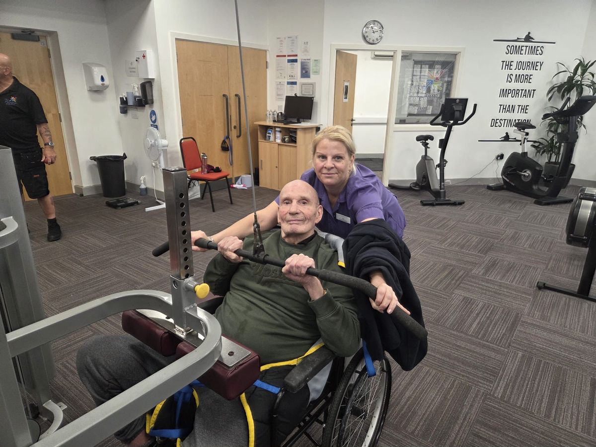 Bob and wellbeing coordinator Zoe at the gym