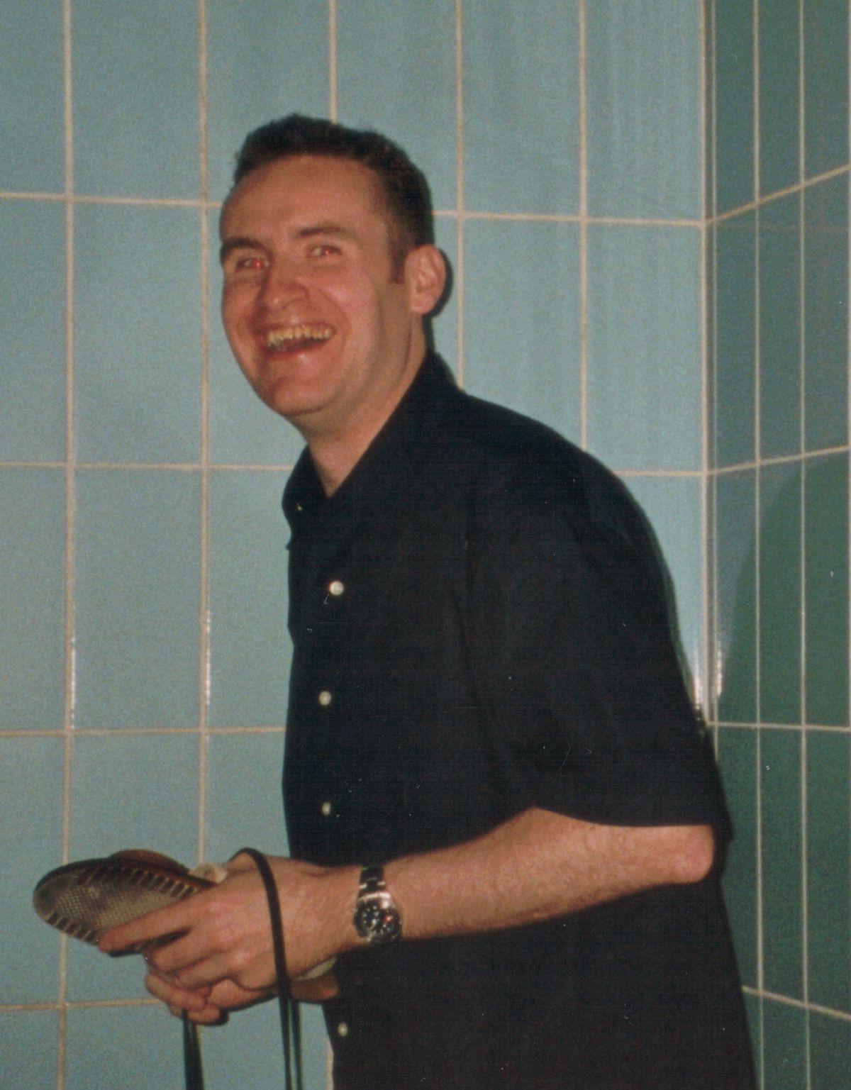 John, pictured at age 23, was told he'd be in a wheelchair by 25 - but that hasn't happened