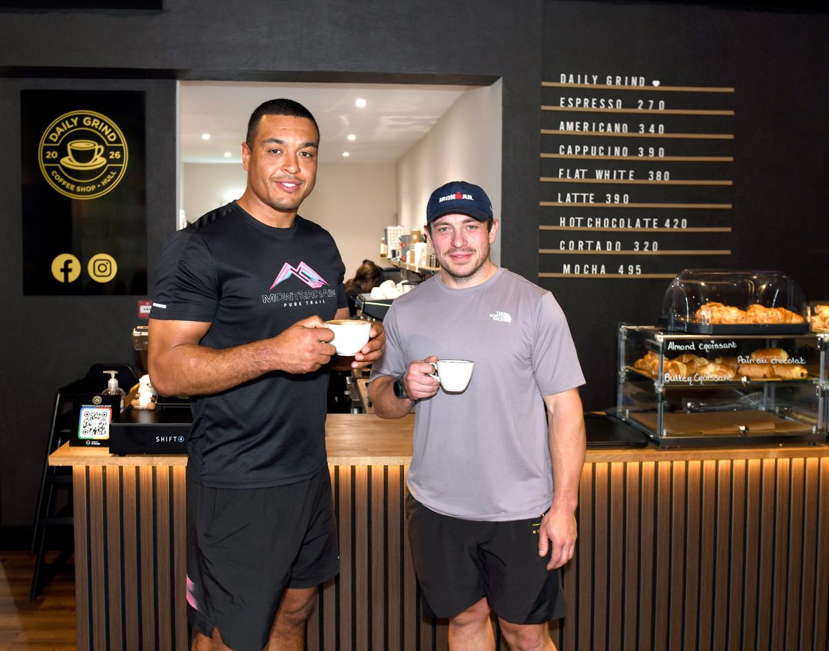 Business partners Reece Lyne, left, and Callum Taylor, inside their Daily Grind coffee shop
