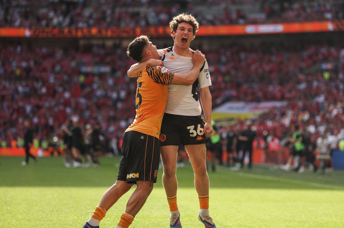 Lewis Koumas and Ryan Giles celebrate the win at Wembley
