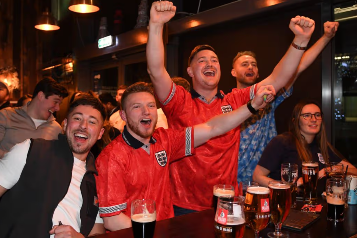 England fans cheering on the Three Lions