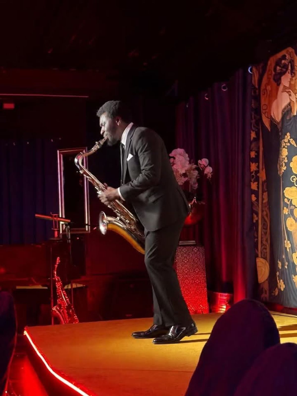A saxophonist at The Gilded Lounge's new cabaret show
