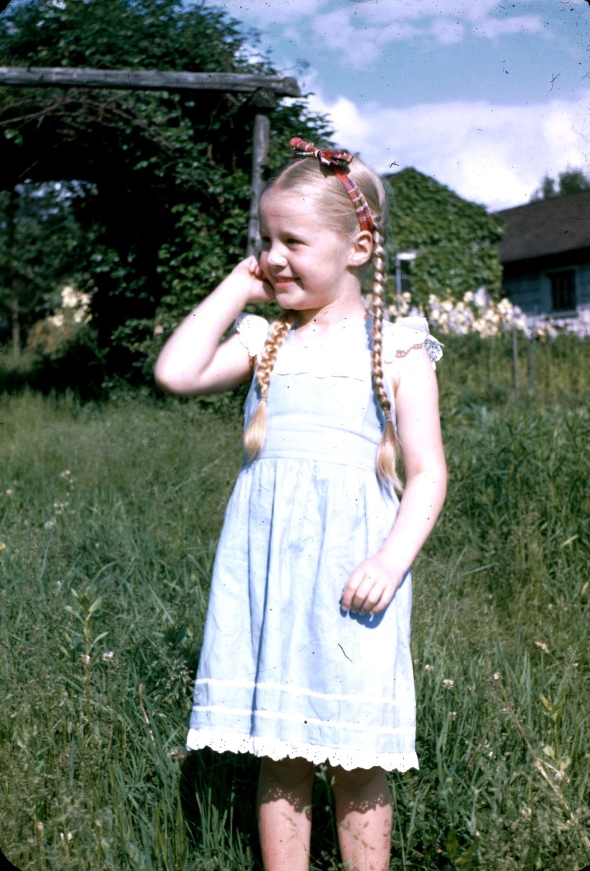 Susan Walton in her New York garden as a child, 80 years later she will walk 100 miles for CARE International