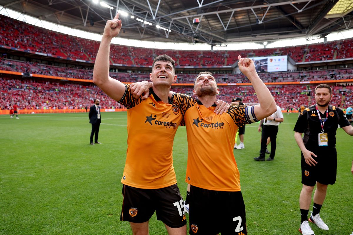 John Egan and Lewie Coyle look to the sky at Wembley