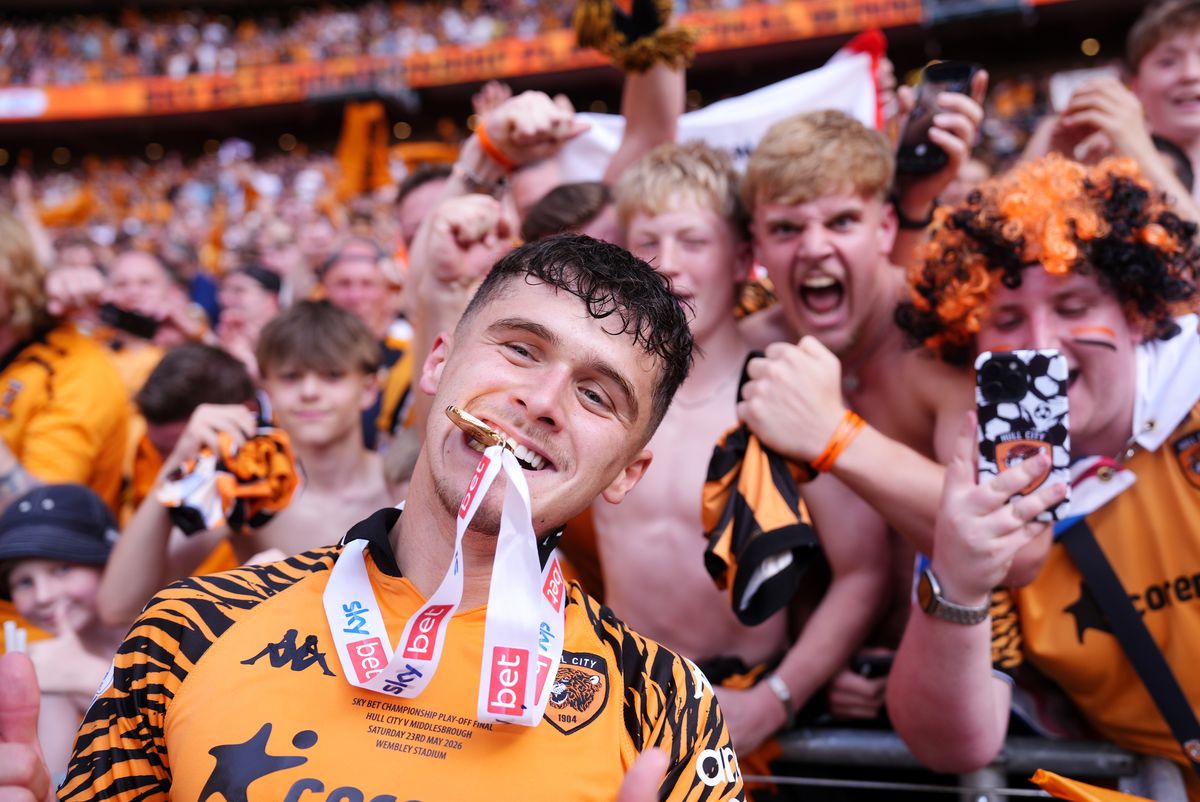 Hull City's Ryan Giles celebrates with Tigers' fans at Wembley