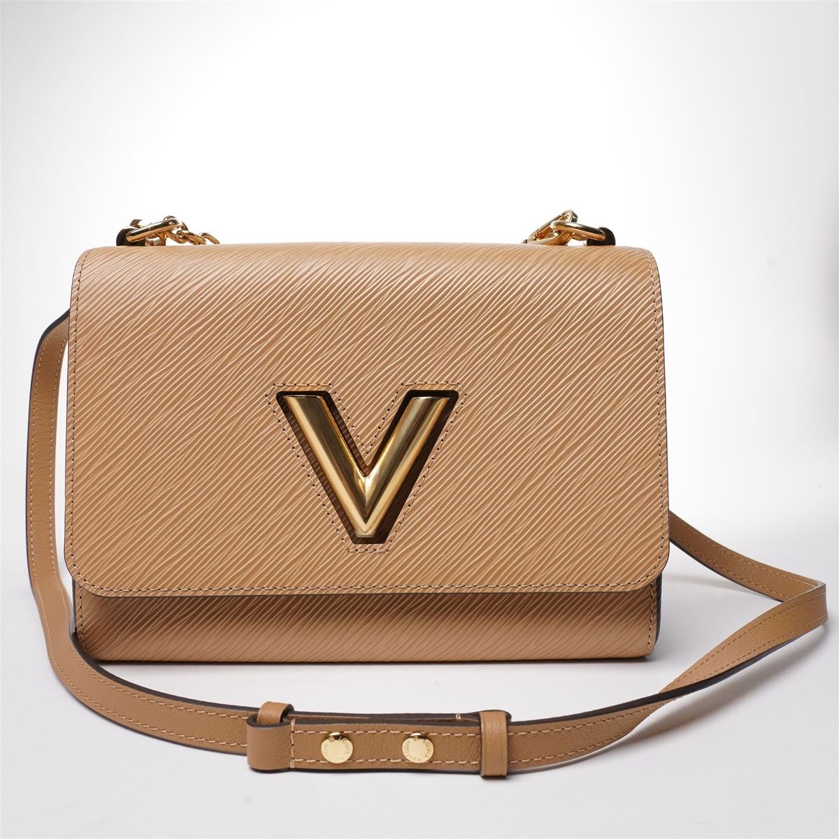 Worth a pretty thousand or two . . . a Louise Vuitton Twist Moyene Modele bag