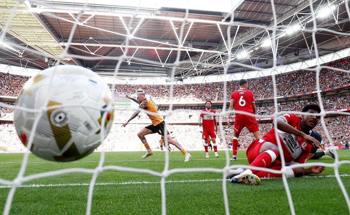 The iconic Wembley image and Oli McBurnie heads off to celebrate his winner against Boro
