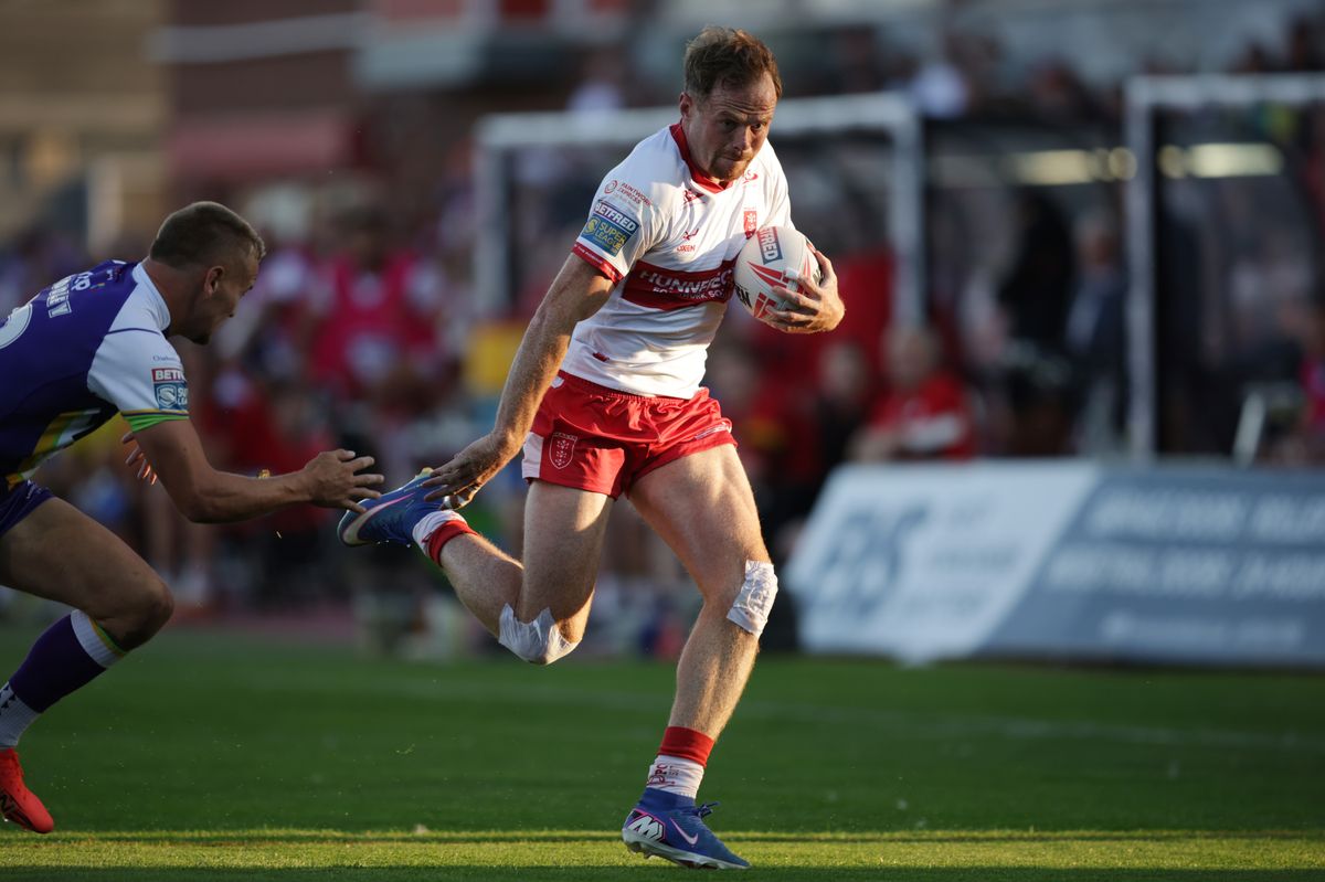 Hull KR winger Joe Burgess runs in for the first try.