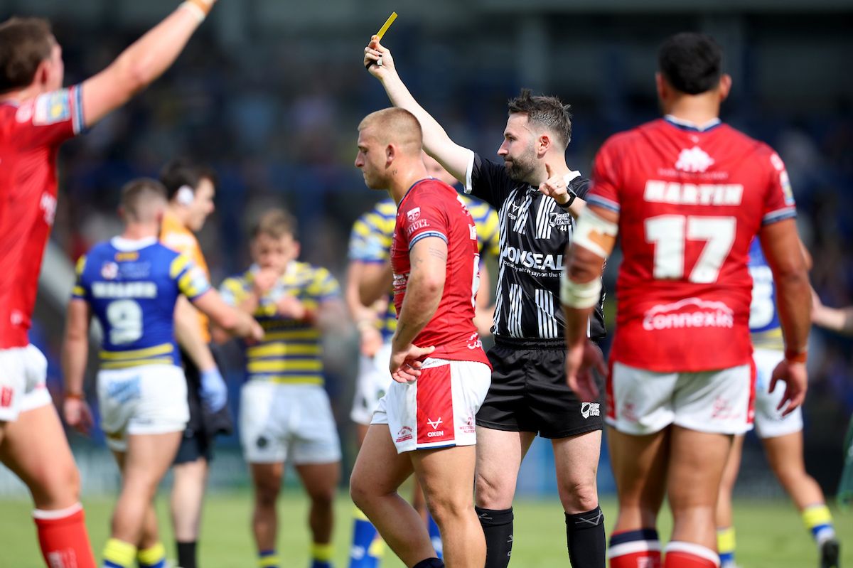 Mikey Lewis of Hull Kingston Rovers is sent to the sin bin by referee Liam Moore