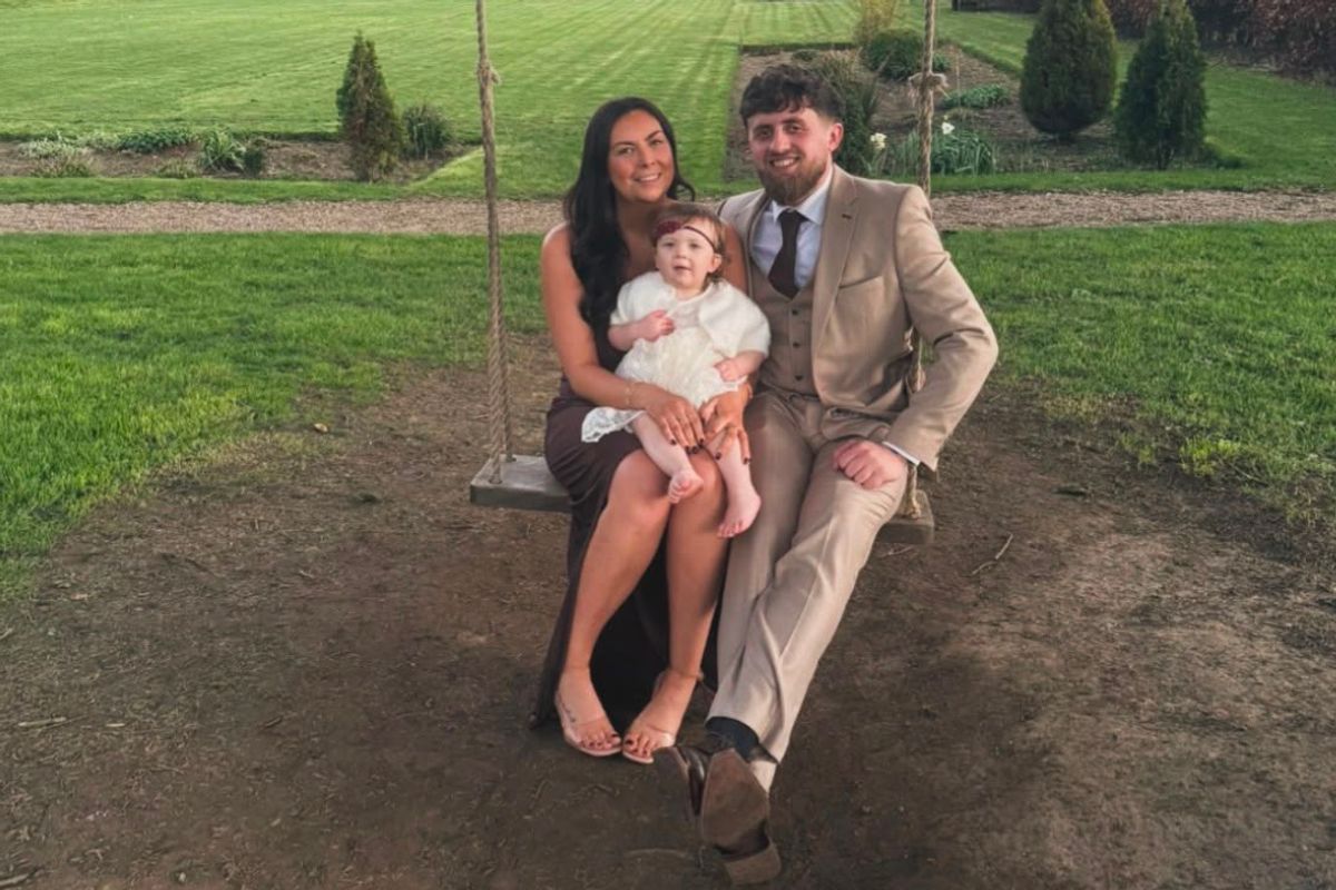 Katie Woolston with partner Tom Buck and daughter Betsy