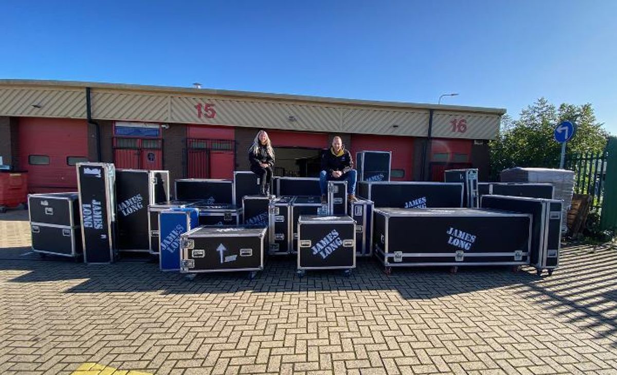 James and Maddy sit on over a dozen boxes of specialist equipment required for the show