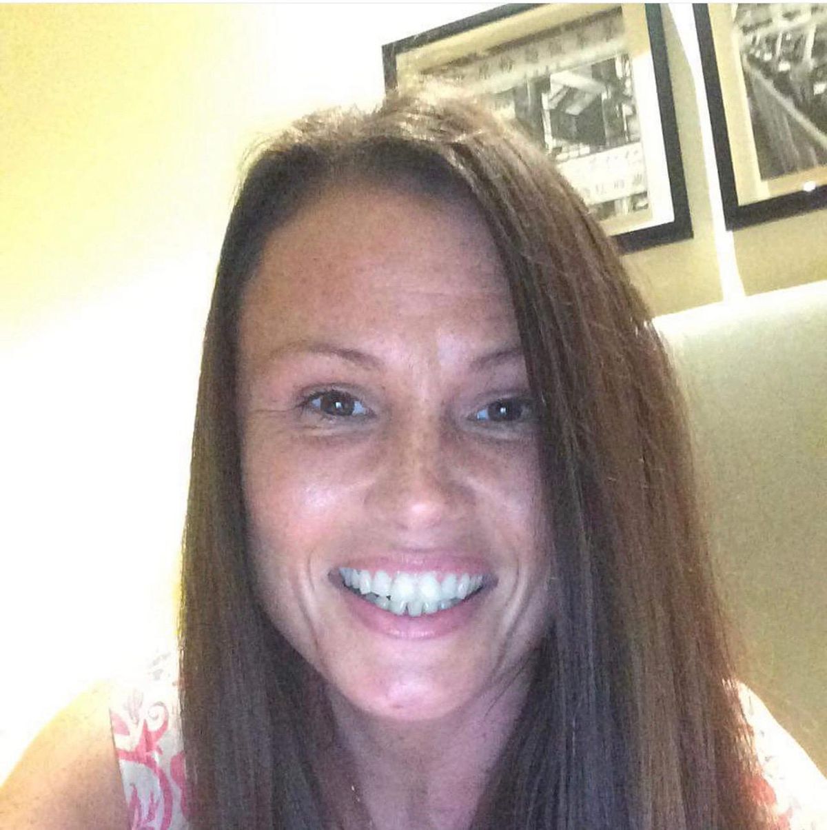 Headshot of Emma Keefe smiling at the camera