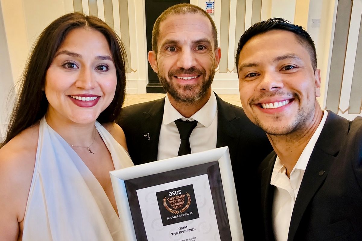 Brasa owners Joe Amorim, Paulo Amorim and Maria Sanchez with their award