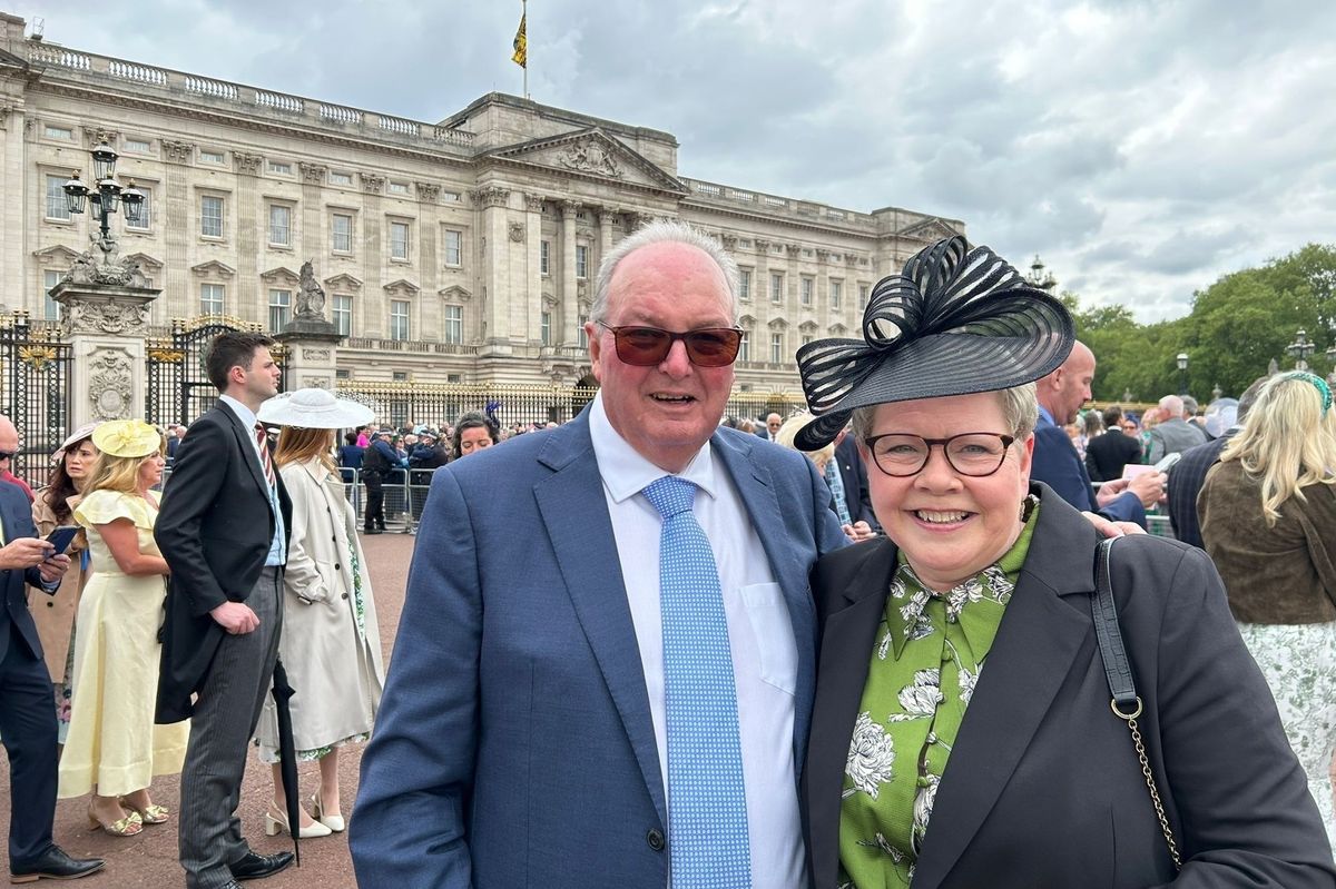 Ron Dickinson and his wife, Gill, at a Buckingham Palace Garden Party