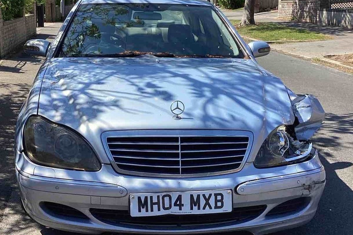 A badly-damaged Mercedes S320 left parked on the street in Kirk Ella