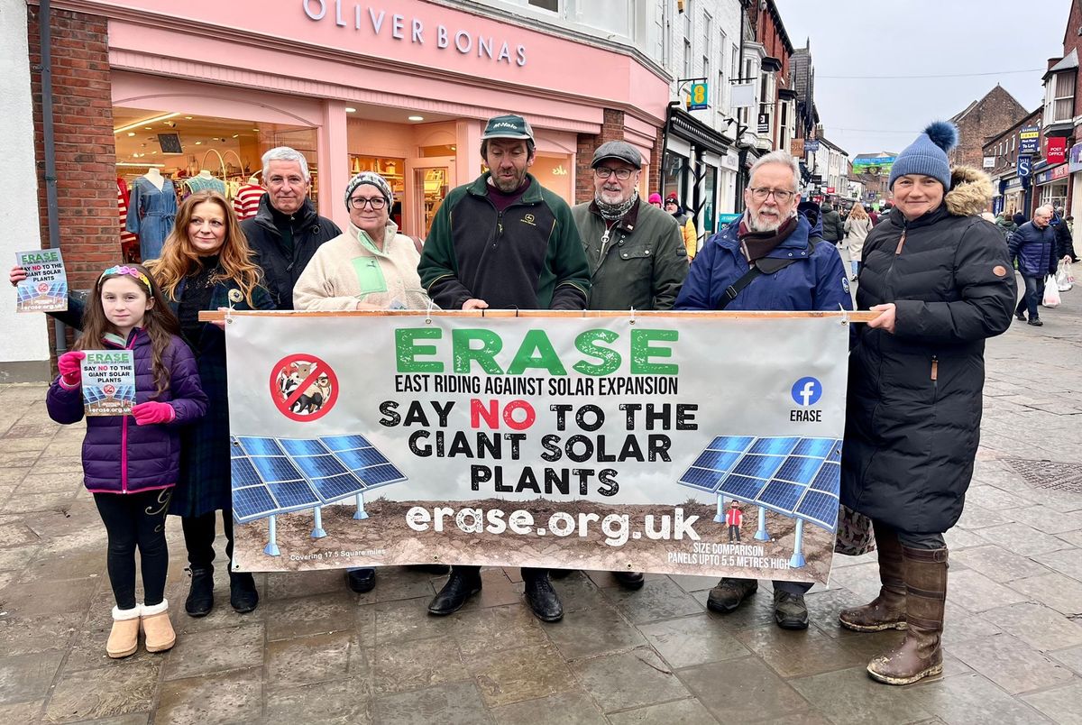 ERASE (East Riding Against Solar Expansion) campaigners in Beverley, with a banner