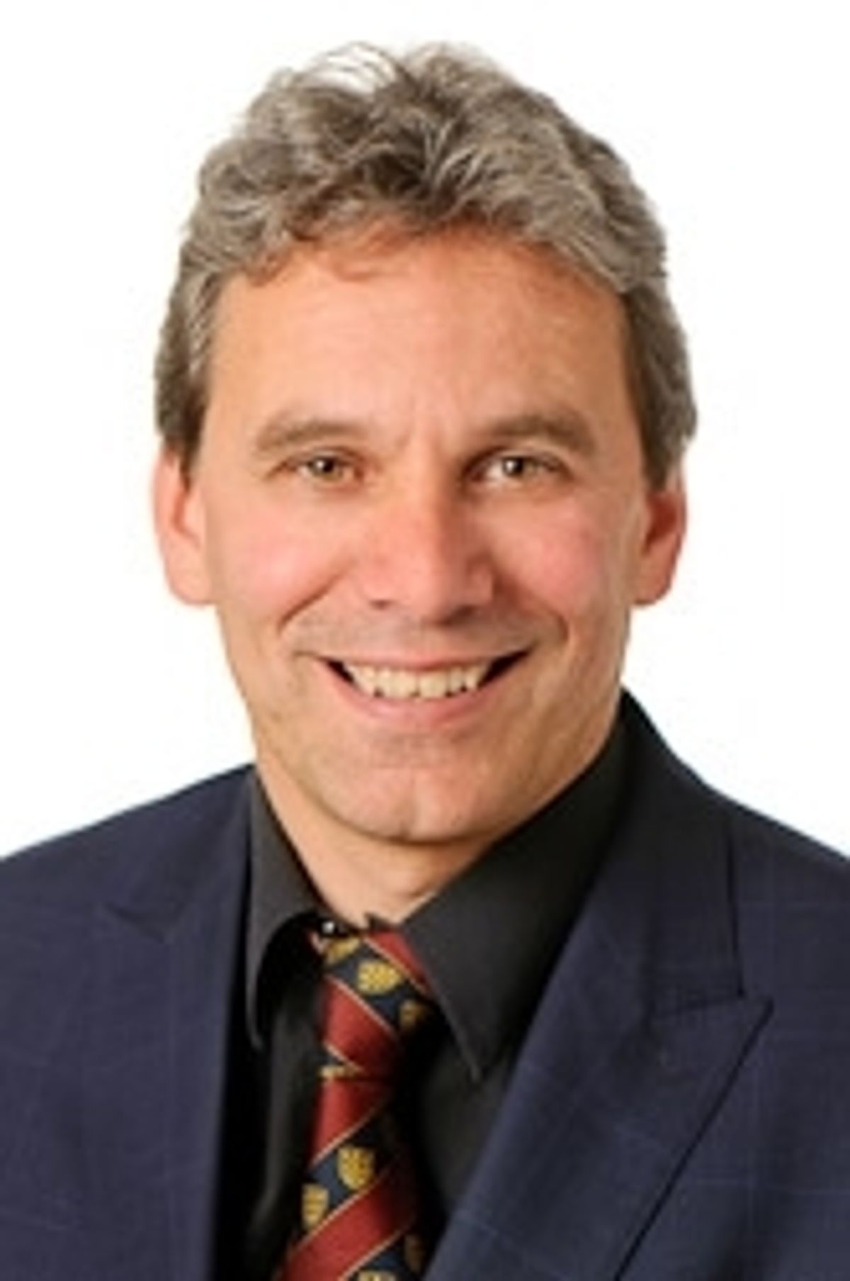 Cllr Daren Hale, pictured, stated, 'We very much want that hotel to be returned to usage as a hotel.'