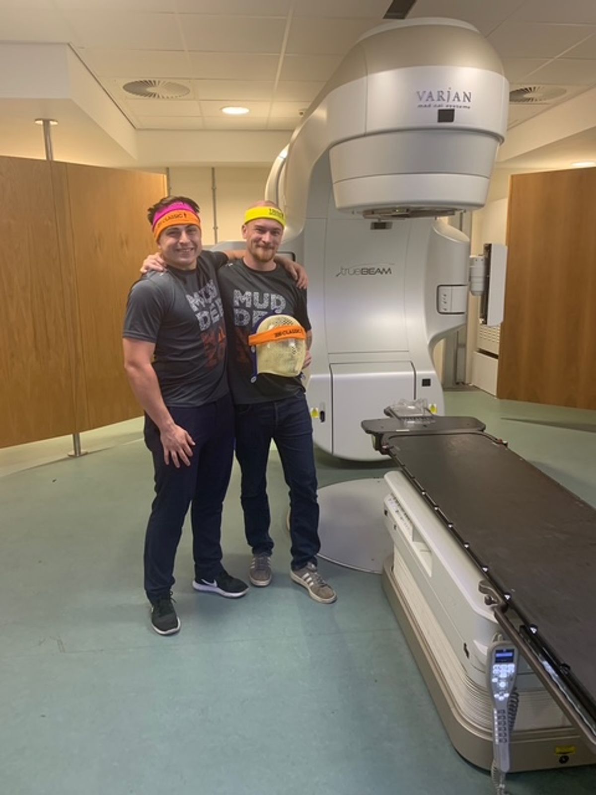 Matt with one of his nurses on his last day of radiotherapy