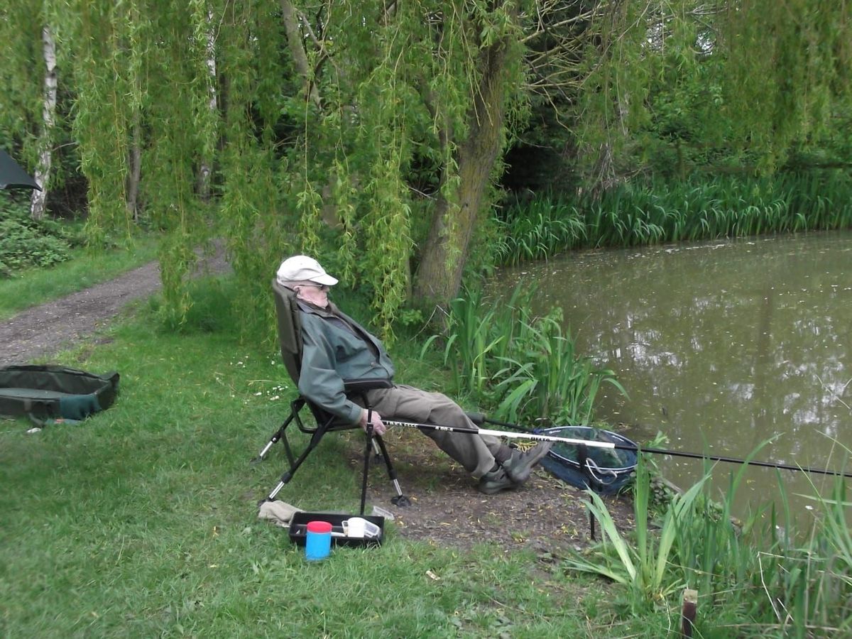 Peter in classic fishing pose on one of his trips