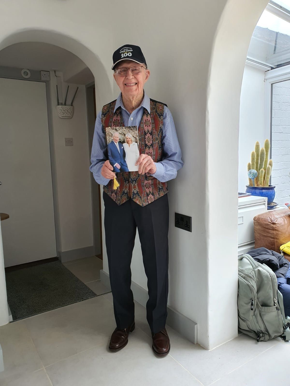 Peter with his card from the King and Queen on his 100th