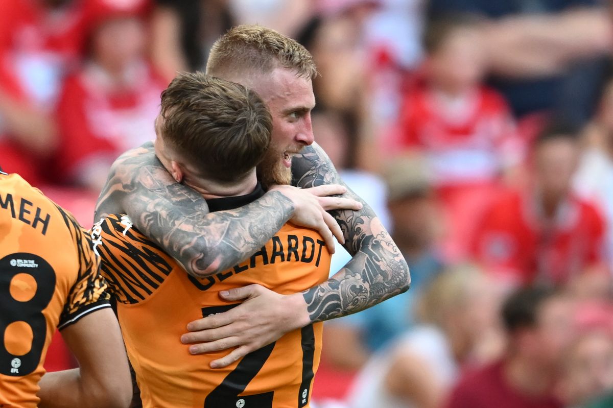 Oli McBurnie embraces Joe Gelhardt after the win at Wembley