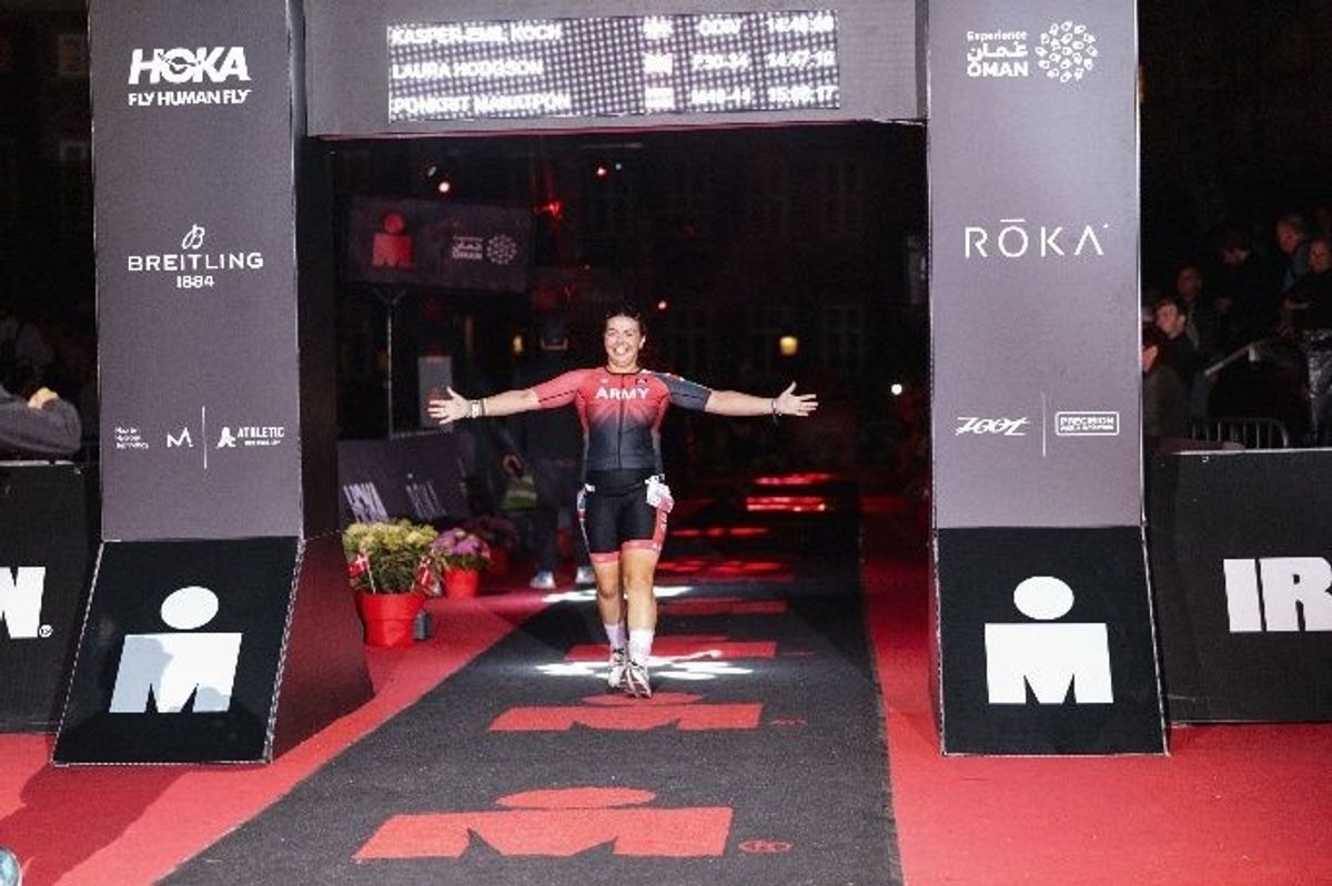 Laura Hodgson crosses the finishing line at the Copenhagen Ironman 2026