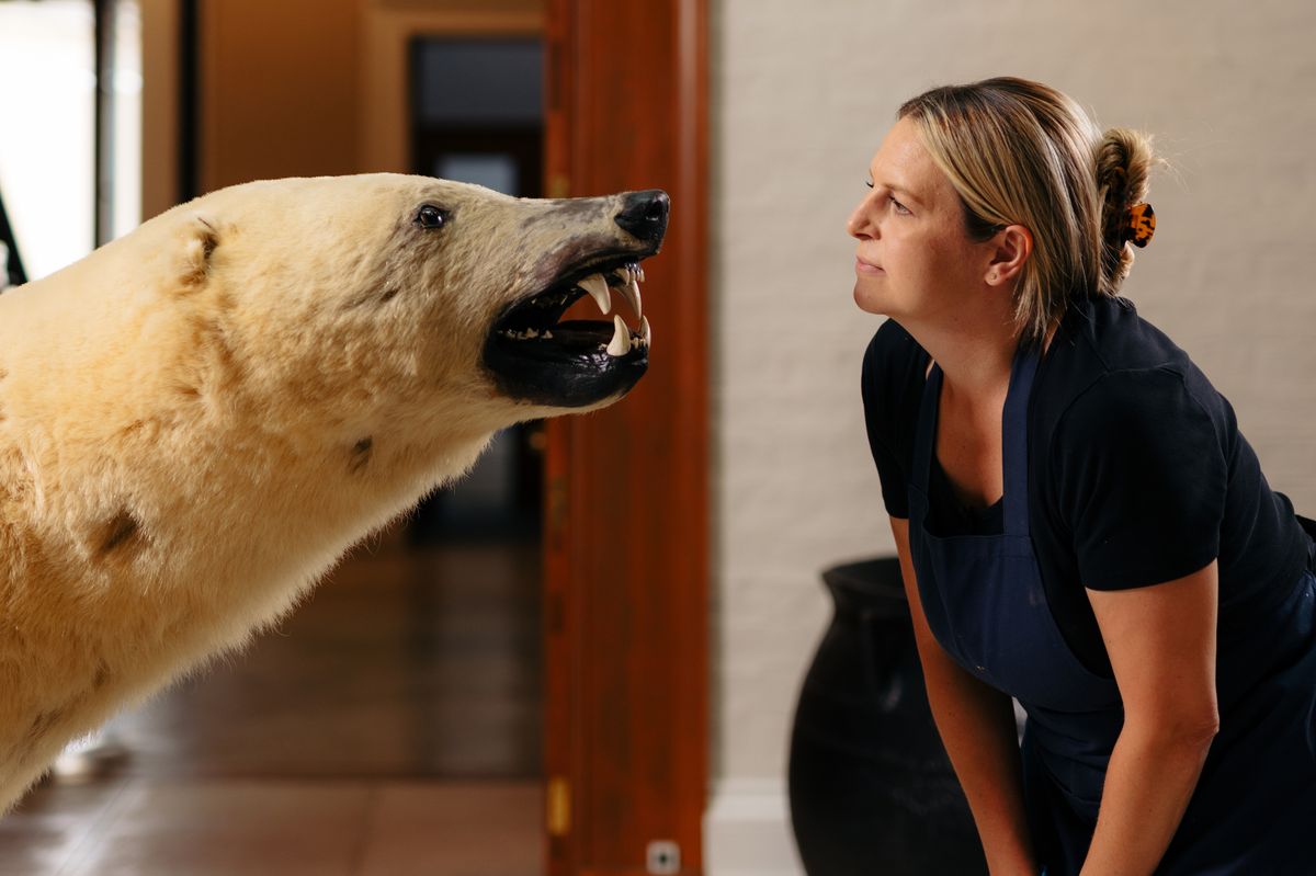 Conservator Lizzie Millar stares into Erik's eyes