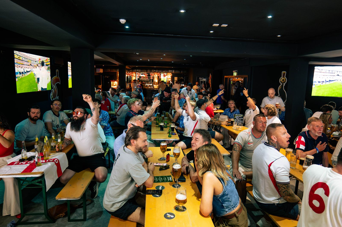 Football fans in the upstairs fan zone at Molly Mangan’s during the World Cup