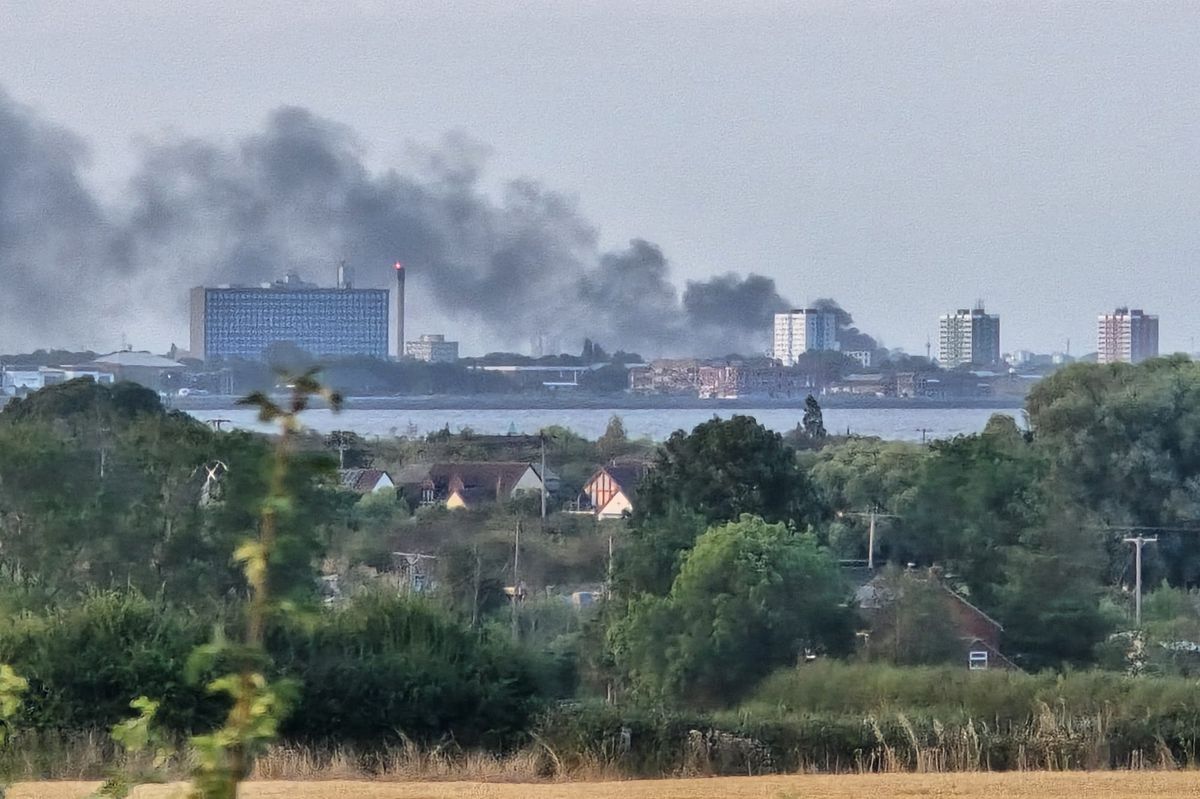 Smoke can be seen in the sky