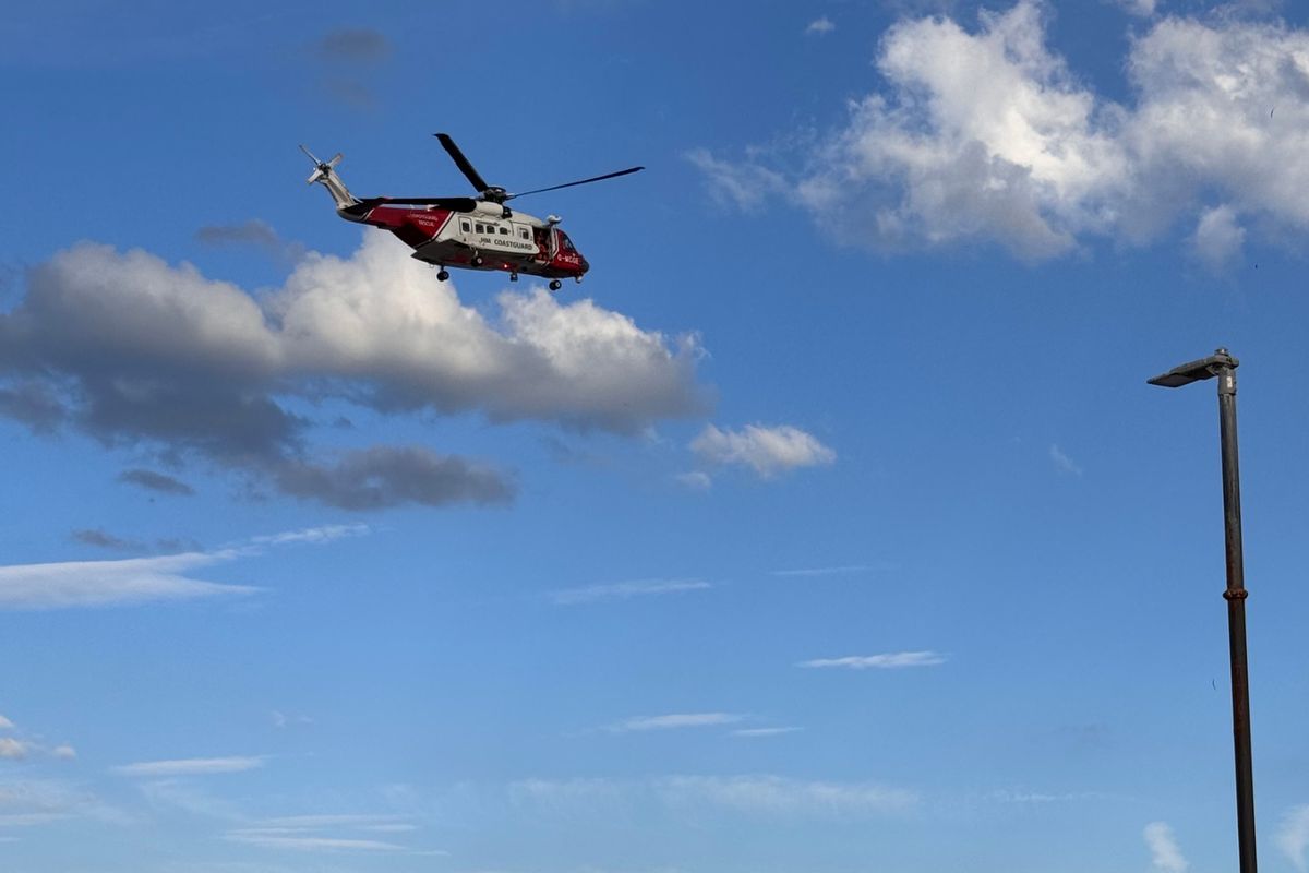 The scene at South Promenade in Hornsea, where emergency services are searching for a 13-year-old boy who reportedly got into difficulty while swimming in the sea