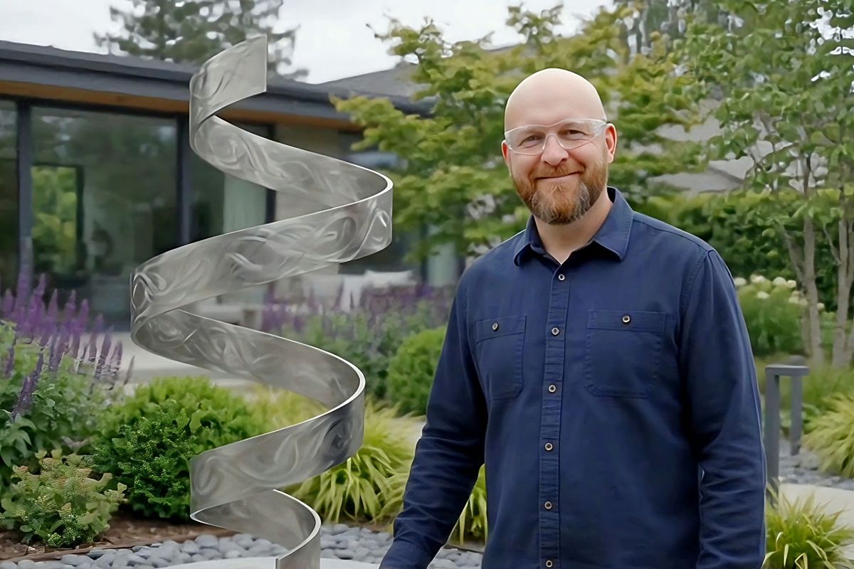 Hull sculptor Christopher Henderson with one of his striking pieces of art