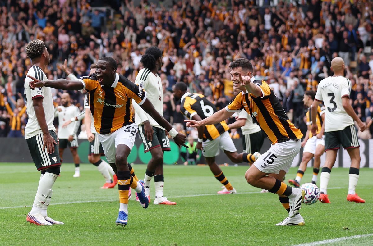 Nobel Mendy of Hull City celebrates scoring his team’s second goal with teammate John Egan during the Premier League 2026/27 match between Hull City and Manchester United at MKM Stadium on August 22, 2026 in Hull, England