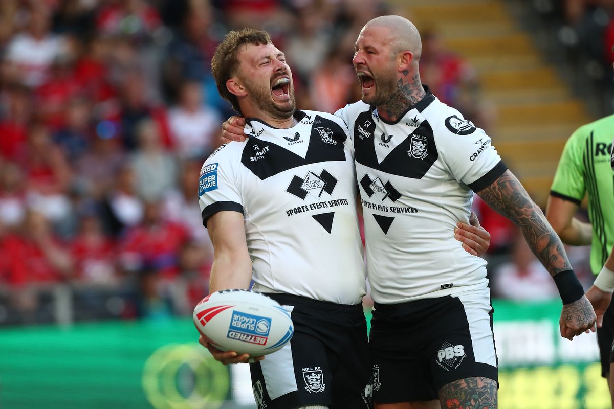 Hull FC forward Joe Batchelor celebrates scoring the first try with Zak Hardaker.