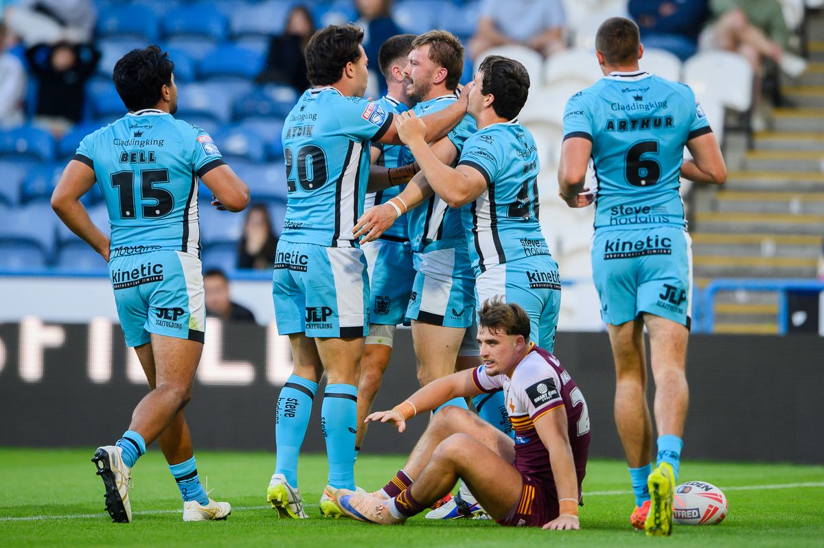 Hull FC celebrate Joe Batchelor''s try against Huddersfield.