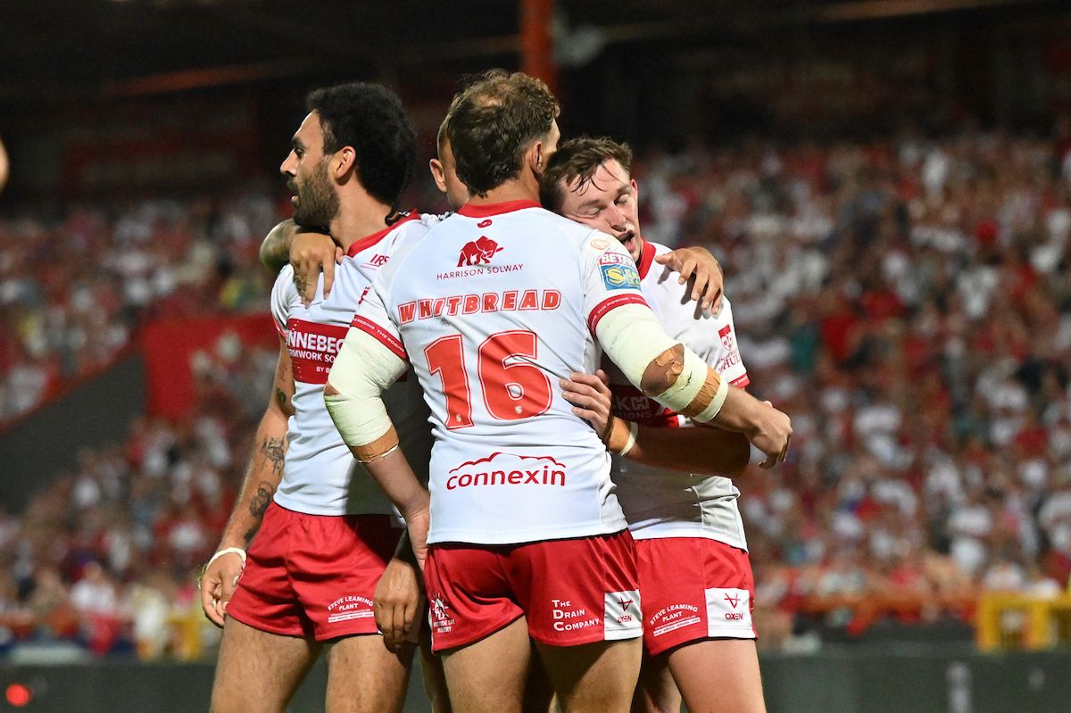 Hull KR celebrate Tyrone May's try against Catalans.