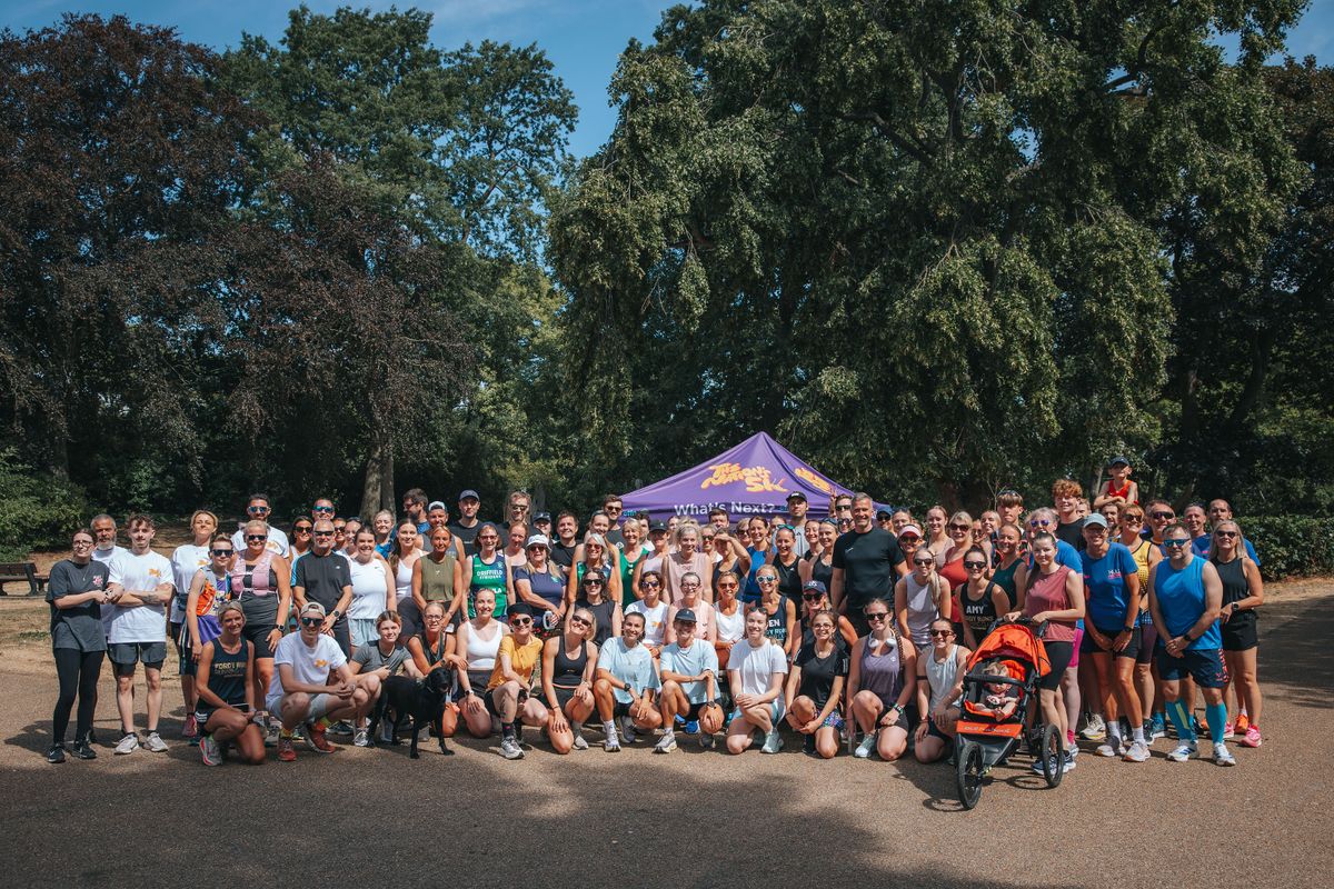 Esmée Gummer, centre, with the Hull ParkRun participants ahead of the city's leg of her Guinness World Record attempt for the most consecutive free 5k events hosted by one person.