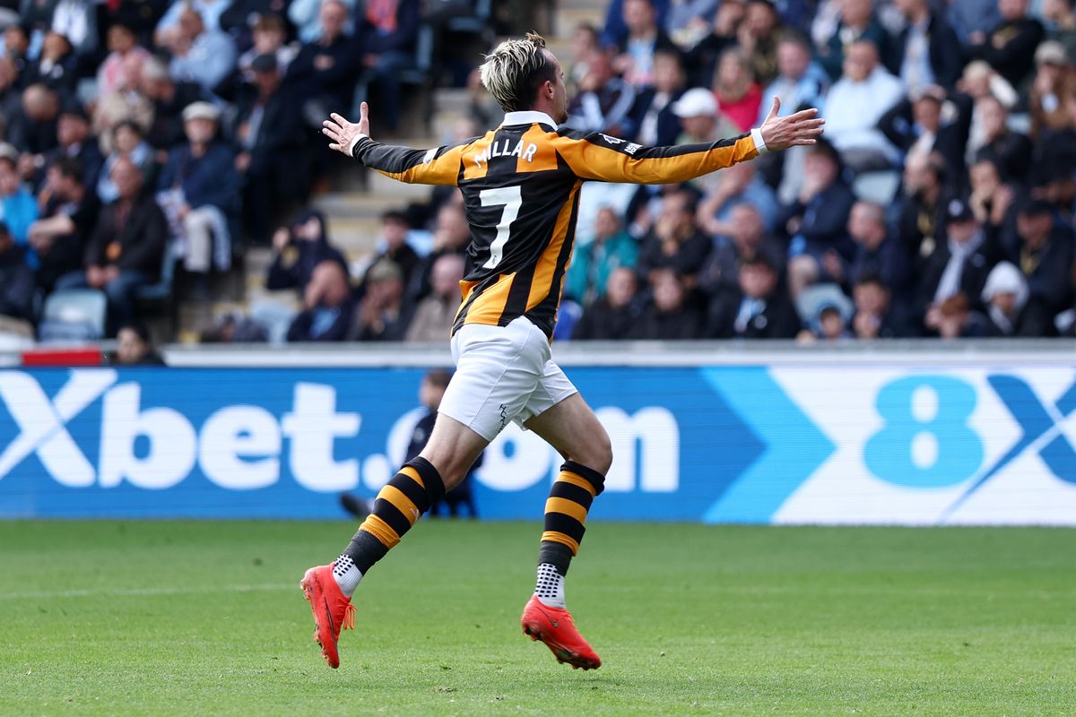 Liam Millar celebrates scoring a goal for Hull City