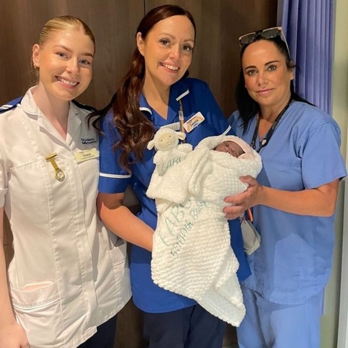 Student midwife Grace Robson, midwife Danielle Shepherd and maternity support worker Kathleen Betts with baby Louisa