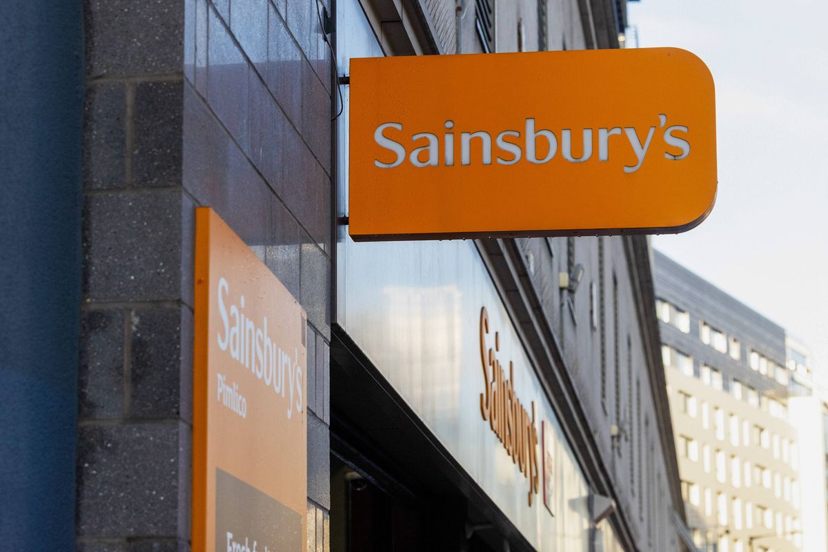 A sign above the entrance to a Sainsbury's supermarket