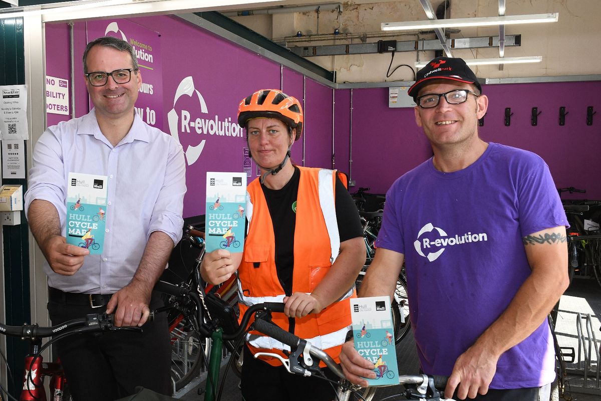 Hull’s new cycle map is available now from locations across the city, including the Trinity Market Cycle Hub. From left, Councillor Mark Ieronimo, of Hull City Council, Rebecca Rose, from First Step Sports and Barry Steward, of R-evolution