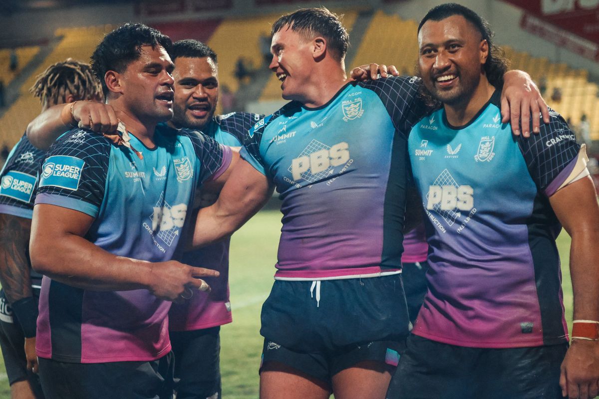 Harvie Hill celebrates Hull FC's win at Catalans with teammates Herman Ese'ese. Sam Lisone, and Ligi Sao.