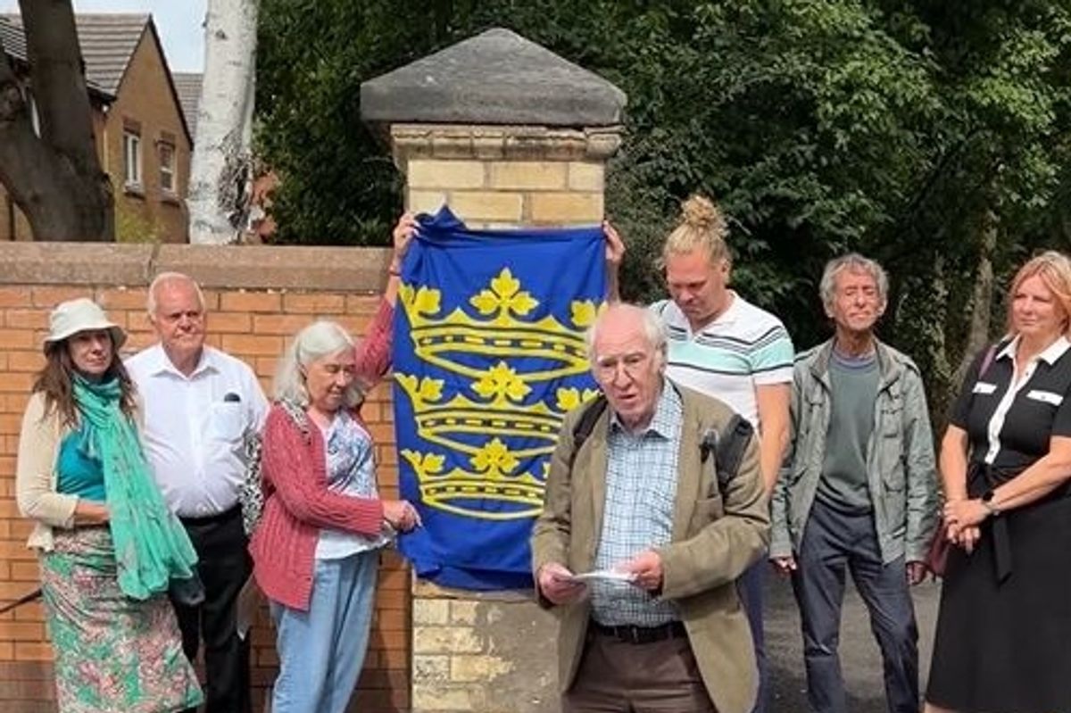 Residents celebrate the opening of revamped Sculcoates Park, Hull - image displays community members at plaque unveiling