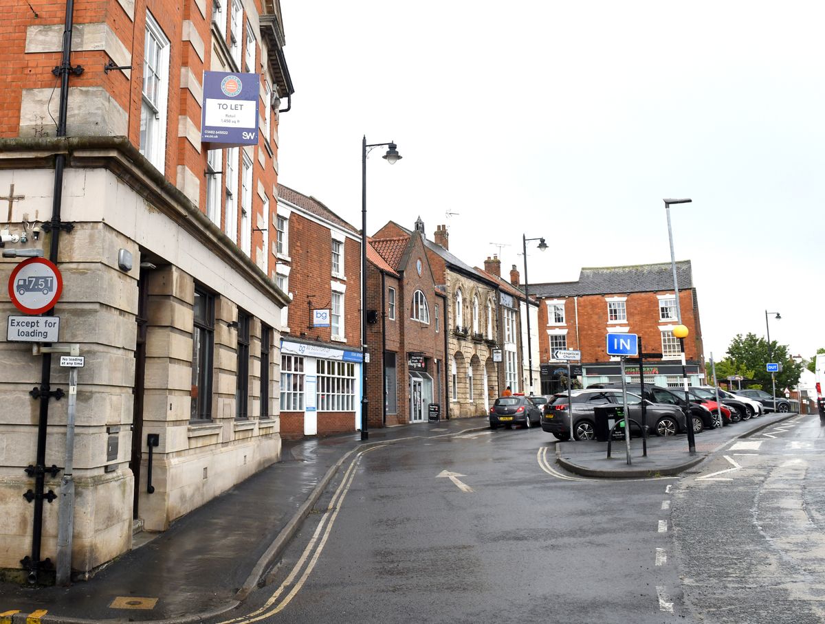 To the immediate left, 1-2 Market Place, Barton-Upon-Humber, as seen in May