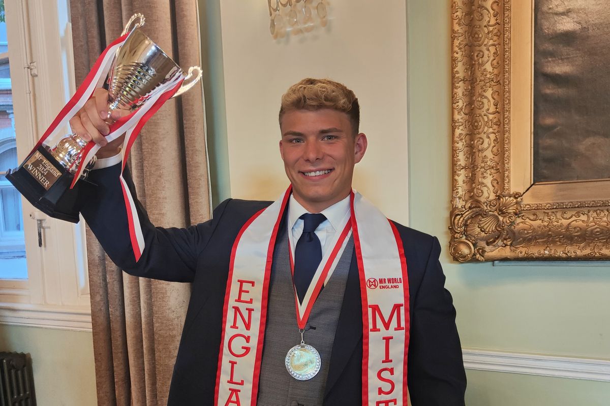 The reigning Mr England, Manuel Alcantara Turner with his trophy