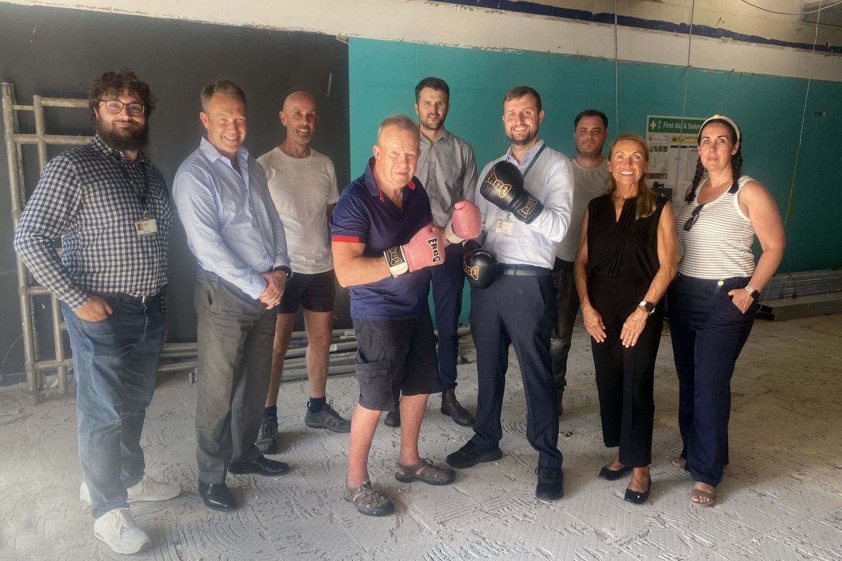 (L-R) Ben Wright, Property Activation Fund Project Coordinator; Phil Jones, Chair of Goole Town Deal; Andrew Horncastle, MBE, Chair of Trustees for GABC; Richard Longthorp OBE (front, boxing gloves), Trustee of GABC; Daniel
Bower of LHL Group, which is project managing the construction work; Nick Coultish (front, boxing gloves) Conservative Councillor for Goole North, and Cabinet Member for Culture, Leisure, and Tourism; James Cooper, site manager at Thompson Construction (Yorkshire) Ltd, Renetta Edwards, Trustee and Head Coach GABC; and Kelly Wood, Trustee and treasurer at GABC.