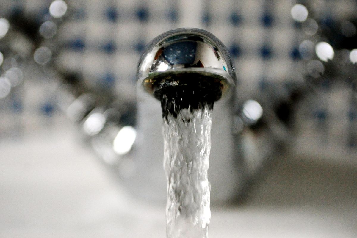 Water runs from a kitchen tap